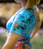 Damska koszulka sportowa niebieska łąka