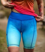 niebieskie legginsy do biegania z kieszonką na telefon błękitna laguna